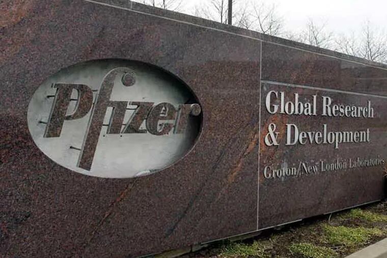 Among the factors clouding Pfizer's financial picture are recent changes in foreign currency rates. (Elise Amendola / Associated Press)