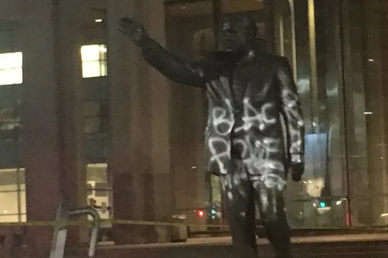 The Frank Rizzo statue in front of the Municipal Services Building in Center City was defaced late Thursday, Aug. 17, 2017.