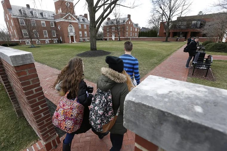 Students walk between buildings at Westminster Choir College in Princeton, NJ on March 3, 2017. DAVID MAIALETTI / Staff Photographer