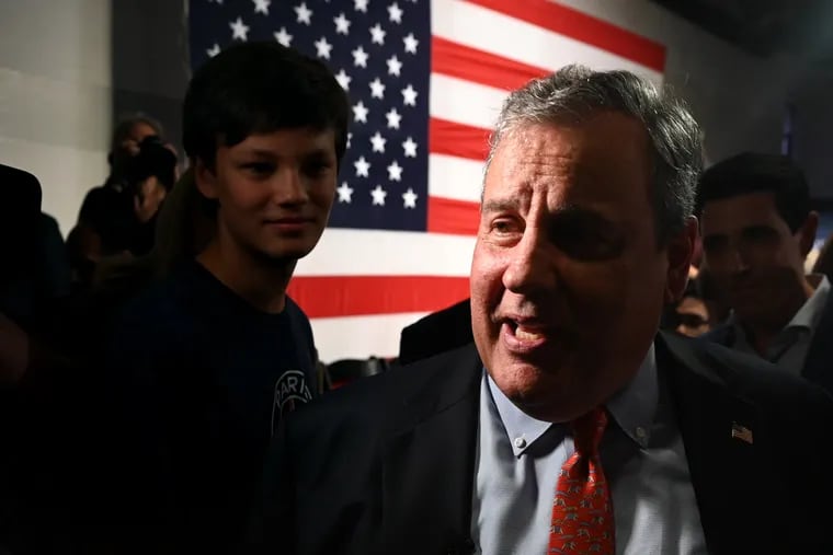Former New Jersey Gov. Chris Christie leaves a town hall in Manchester, N.H., after the launch of his bid for the 2024 Republican nomination for president in June.