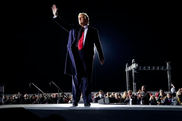 President Donald Trump speaks during a rally on Monday, Jan. 4, in Dalton, Ga. His plea to Georgia's secretary of state to "find" votes was yet another attempt to suppress Black voters, writes Solomon Jones.