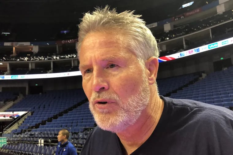 Sixers coach Brett Brown speaking to reporters Wednesday at the Mercedes-Benz Arena in Shanghai.