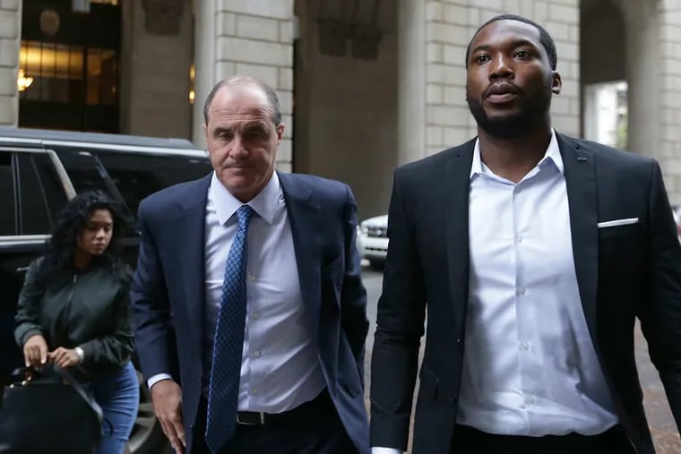 Rapper Meek Mill, right, arrives at the Criminal Justice Center in Philadelphia with his attorney Brian McMonagle, on November 6, 2017.