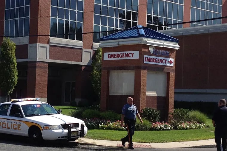 Police block off the emergency entrance at Kennedy University Hospital-Stratford shortly before 10:30 a.m. Wednesday after a report of a double shooting inside the South Jersey hospital. The Camden County Prosecutor's Office is investigating.