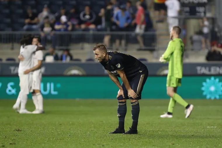 Kacper Przybylko, center, of the Philadelphia Union leans on his knees after the game with the Rapids ended in a 1-1 tie at Talen Energy Stadium on May 29, 2019.  Kacper Przybylko missed a scoring opportunity late in the game.