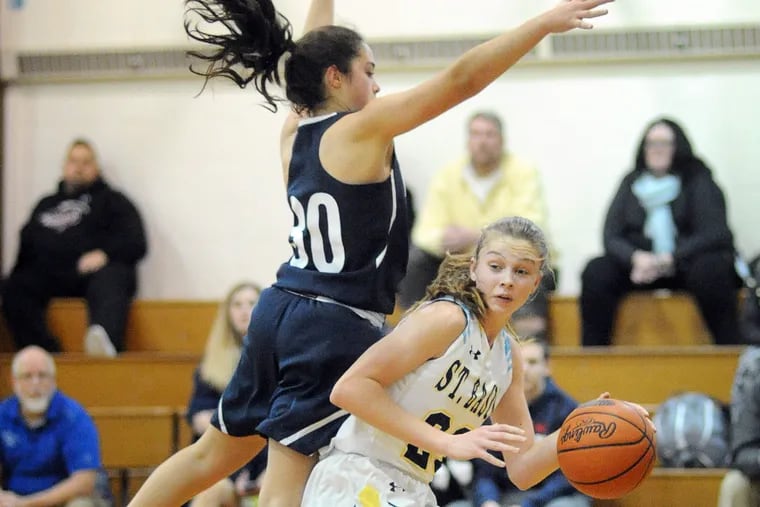 St. Basil's Casey Remolde (23) drives to the basket against Merion Mercy.