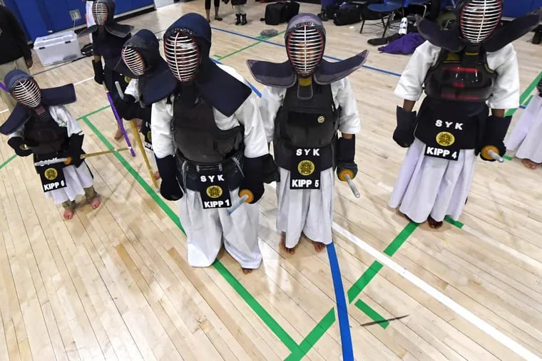 Middle school students line up during for a Kumdo class at Kipp Lanning Square in Camden, N.J. Wednesday, March 28, 2018. Kumdo is an elite Korean martial arts sport, often called the golf or polo of martial arts because the gear and uniforms are expensive.