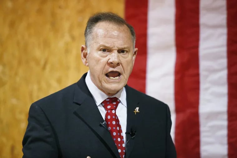 In this Nov. 30, 2017 file photo, former Alabama Chief Justice and U.S. Senate candidate Roy Moore speaks at a campaign rally, in Dora, Ala. Most statewide Republican officeholders in Alabama say they're voting for Moore for U.S. Senate, but the state's senior U.S. Sen. Richard Shelby didn't vote for Moore. Polls show Moore in a tight race with Democrat Doug Jones.