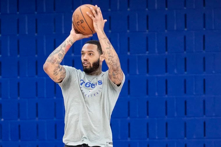 Mike Scott shoots during practice at the 76ers'  complex in Camden on Wednesday.