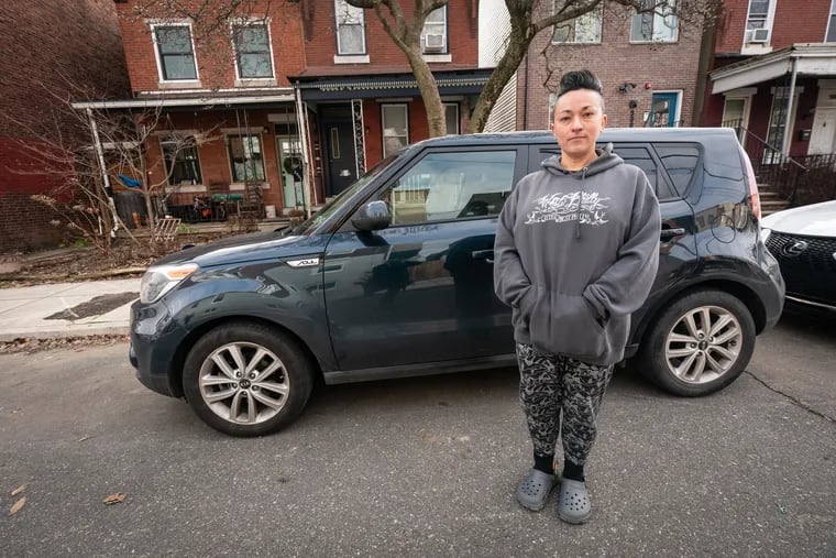 Amy Nieves-Renz had her 2018 Kia Soul stolen right before Thanksgiving, she is shown here with the vehicle, on her block in Philadelphia.