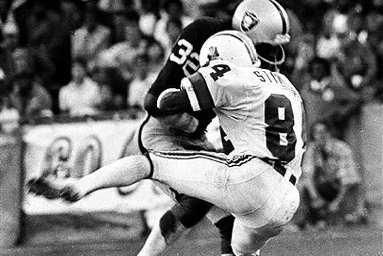This hit by Jack Tatum (32) in August 1978 left Darryl Stingley paralyzed from the neck down. (AP Photo / Oakland Tribune)
