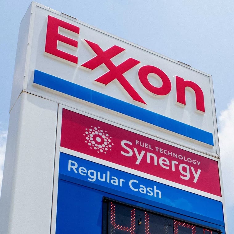 File: Exxon Mobil gas station sign in Houston.