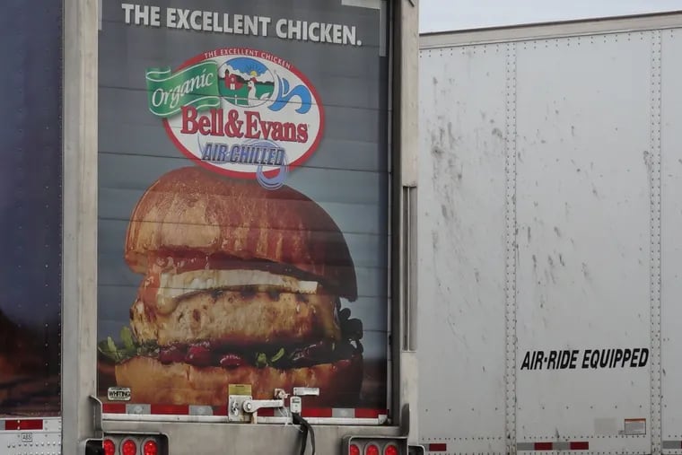 An advertisement for Bell & Evans poultry products is shown on the back of a company delivery truck in Fredericksburg, Pa.