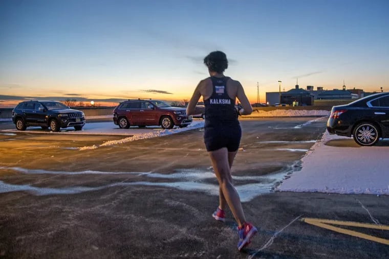 Sally Kalksma runs across the rooftop parking lot, heading to the stairs after her workday at the Ocean County government complex in Toms River. A single mom who was diagnosed with myeloma in 2009, she races vertically up buildings.