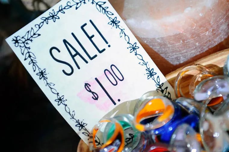 Sarah Lewis' clearance sale. Smaller boutiques want to offer her line. (MICHAEL PEREZ / For The Inquirer)