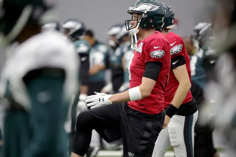 Eagles’ Nick Foles, center, warms up at practice during the bye week in Philadelphia, PA on January 3, 2018. The Eagles will host the Falcons on Saturday, January 13.