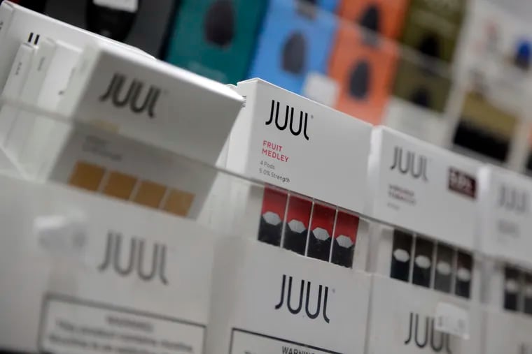 Juul products are displayed at a smoke shop in New York.