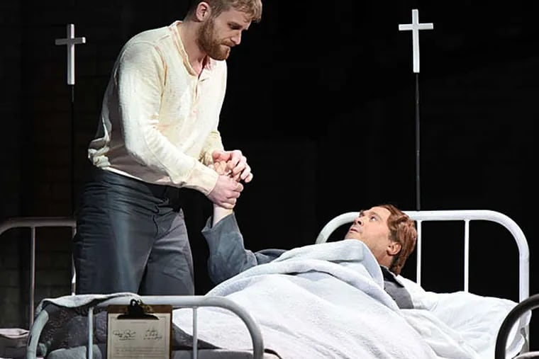 Oscar (David Daniels) befriends several infirmary patients (including a man portrayed by Jarrett Ott). (Opera Philadelphia | Photo by Kelly & Massa)