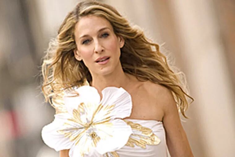 In this image released by New Line Cinema, Sarah Jessica Parker stars as Carrie Bradshaw in New Line Cinema's "Sex and the City". (AP)