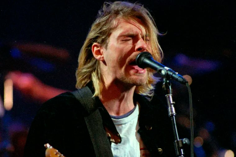 In this Dec. 13, 1993, file photo, Kurt Cobain performs in Seattle.