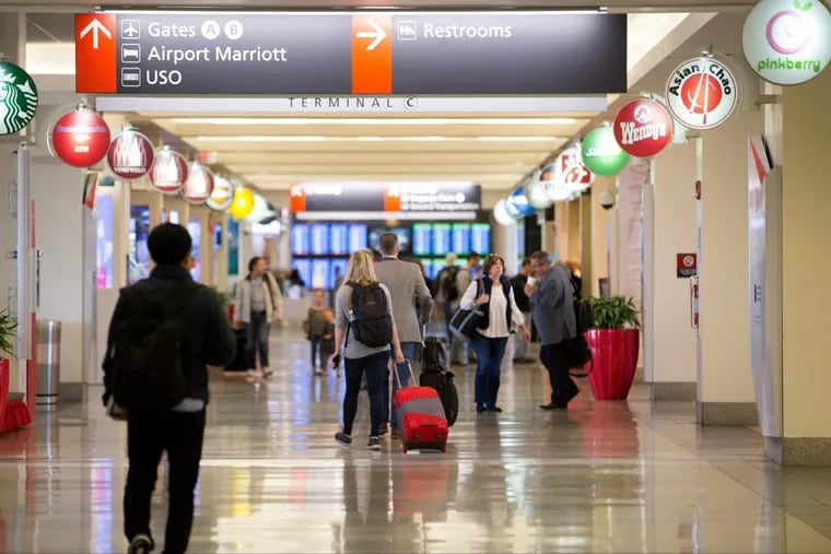 Travelers at the Philadelphia International Airport.
