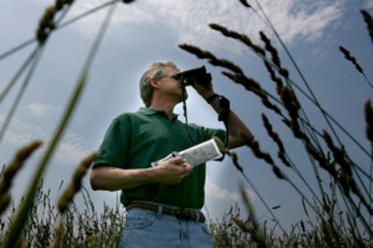 scans the skies for birds. H.F. "Gerry" Lenfest donated 568 acres to the Natural Lands Trust to help create the preserve.