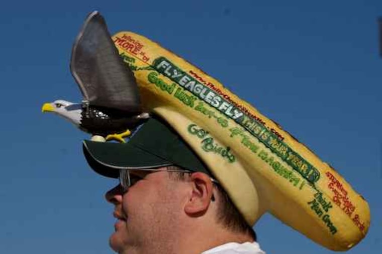 Mike Paquin of Landsdowne, wears a cheesesteak hat with a mechanical eagle that flaps.