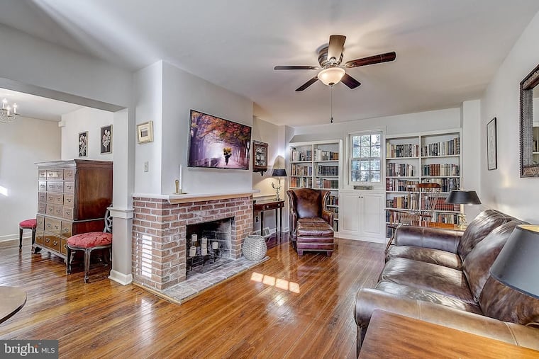 The renovation included refinishing original floors, some of which were covered with tile or linoleum.