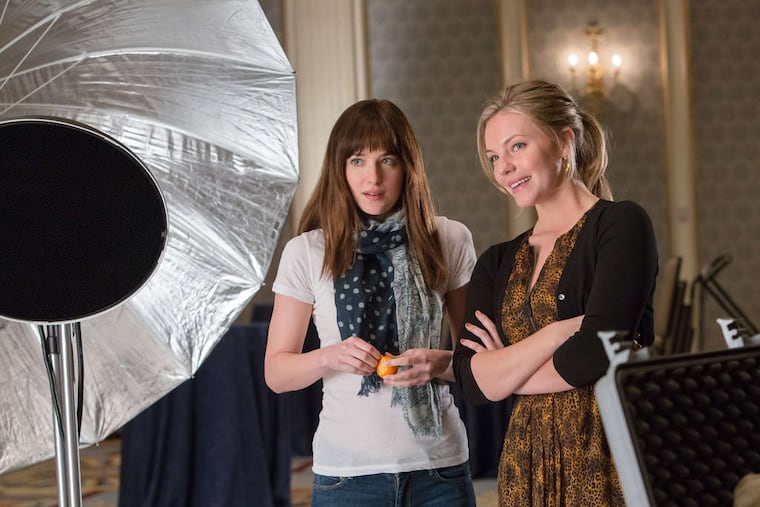 In "Fifty Shades of Grey," Dakota Johnson (left) is a student in a bondage-dominance contract with a billionaire, and Eloise Mumford is her best friend.