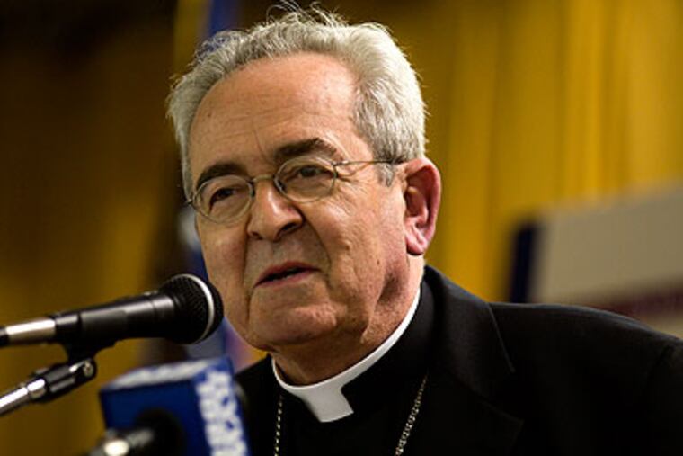 "Whoever harms a child must remember the words of Jesus: It would be better for him to have a great millstone hung around his neck and to be drowned in the depths of the sea," Cardinal Justin Rigali said at an Ash Wednesday Mass. (File photo: Ed Hille / Staff Photographer)