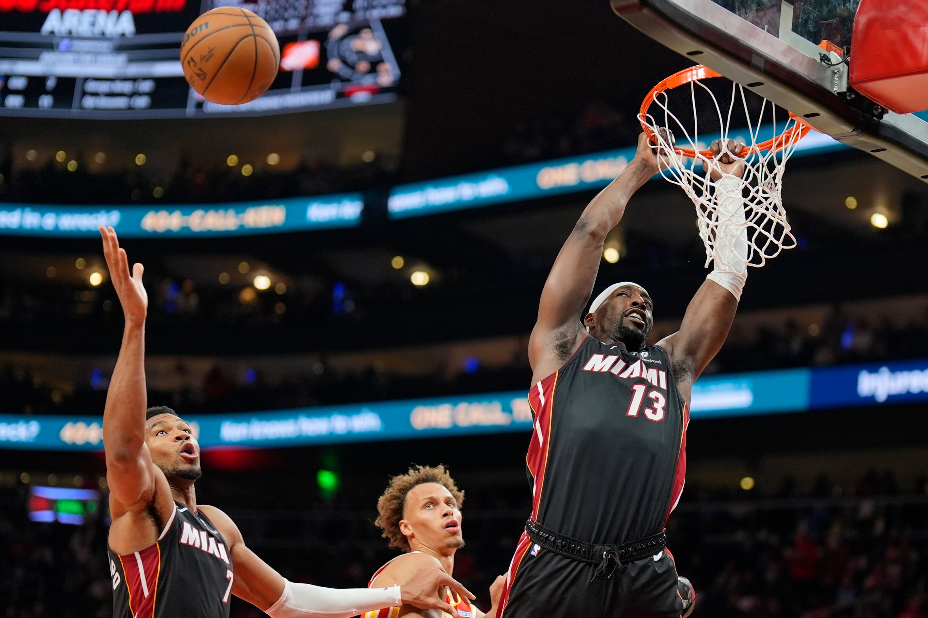 Giannis Antetokounmpo has 24 points, 18 rebounds as the Heat beat the Hawks 129-117 for first win