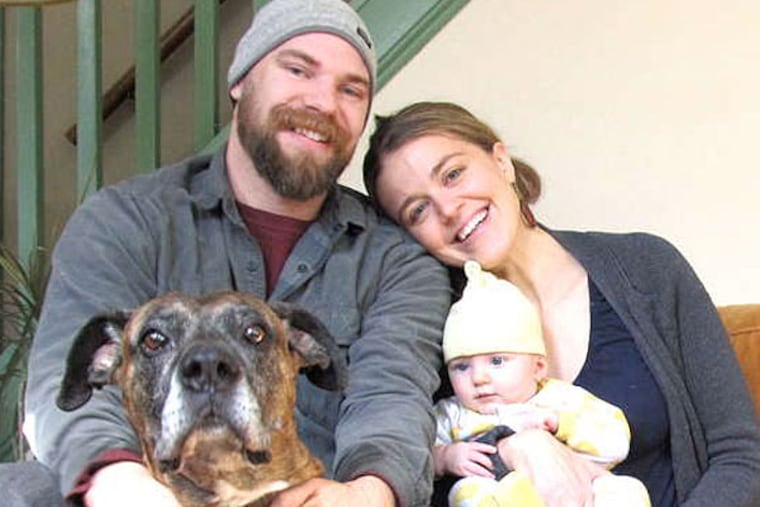 Josh Buchs, Evelyn Shober, daughter Skylar Lucia Shober, and baby- soother Scuba.