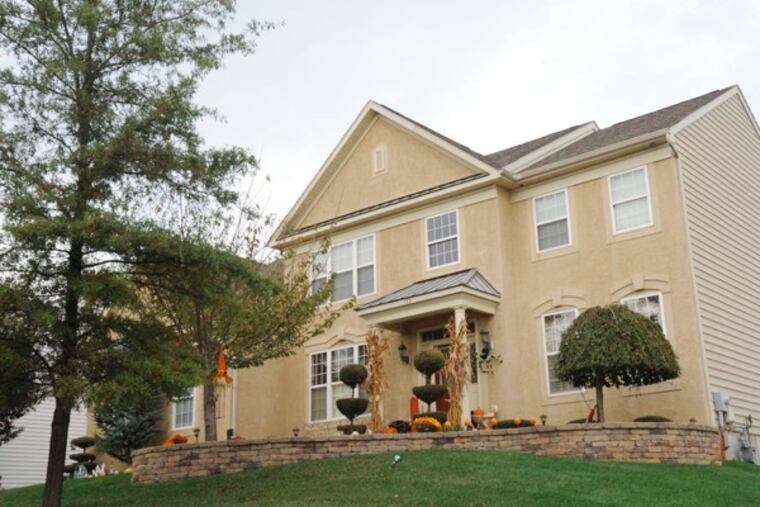 On Tatham Road. Bensalem's older housing stock keeps prices lower, but newer homes can go as high as $500,000. (April Saul / Staff Photographer)