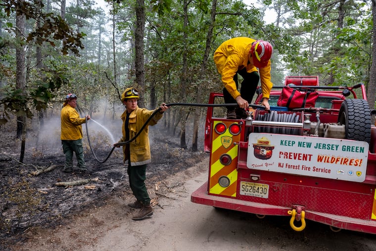 Firefighters battle a blaze in the Wharton State Forest in 2022 that burned some 15,000 acres. Crews said Sunday they were battling a wildfire in the forest near the former Atco Dragway in Camden County.