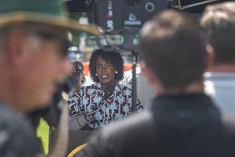Speaking at a news conference while under a tent on Wednesday, Mayor Cherelle L. Parker outlines public safety and transportation plans ahead of a July 4 concert expected to draw thousands to the Benjamin Franklin Parkway.