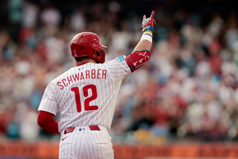 Kyle Schwarber celebrates his 33rd home run of the season on Tuesday.