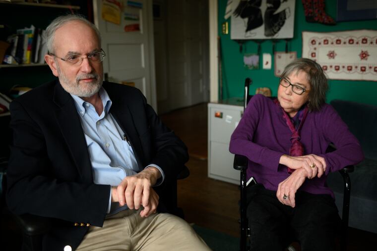 Oncologist Roger Cohen pays Gene Bishop, a retired physician who is dying of cancer, a social visit at her hospice in West Mount Airy, Philadelphia, Pa., on Feb. 12, 2020.