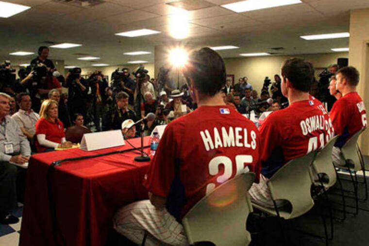 The Phillies' big guns take questions after the first workouts of spring training. "I know there is a lot of hype," Cliff Lee said.