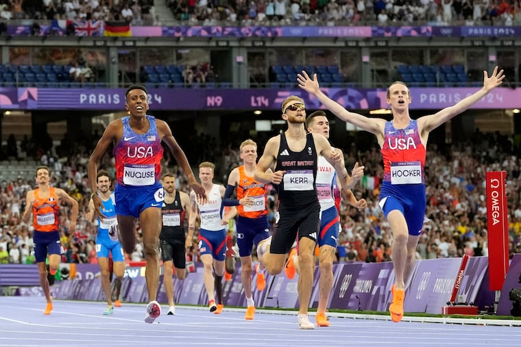 Cole Hocker (right) crossing the line in his come-from-behind win at last year's Olympics, one of the Games' most vivid moments.