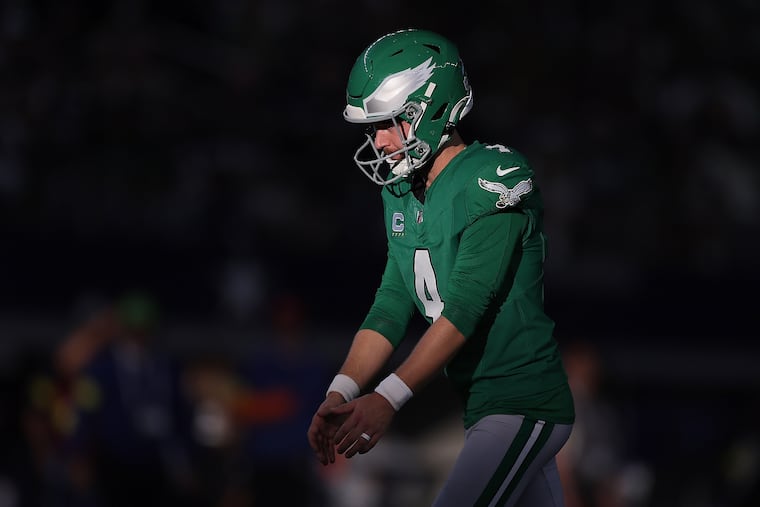 Jake Elliott prepares to kick an extra point against the Dallas Cowboys on Nov. 23 of last season.