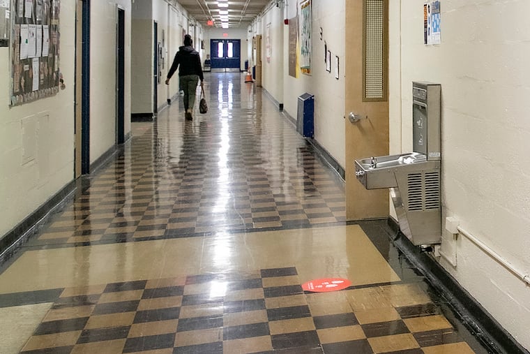 A water filling station in the hallway of Lamberton Elementary School in the Overbrook section of Philadelphia in this 2021 file photo. The city school district has replaced its old water fountains with lead-filtering bottle filling stations, meeting a City Council deadline of June 1 to do so.