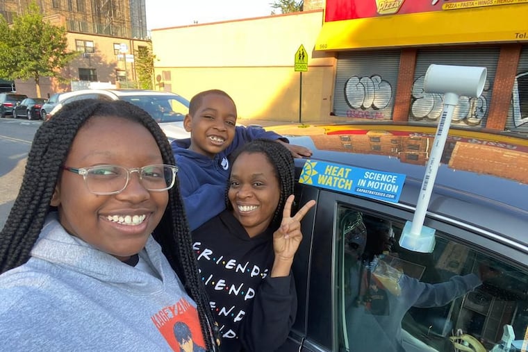 Volunteers Octavia Jones and her two children, Taegan and Tristen Harris, used the sensor attached to the car to collect heat data in the Bronx as part of a previous NOAA and partner Heat Island Mapping Campaign in July 2021.