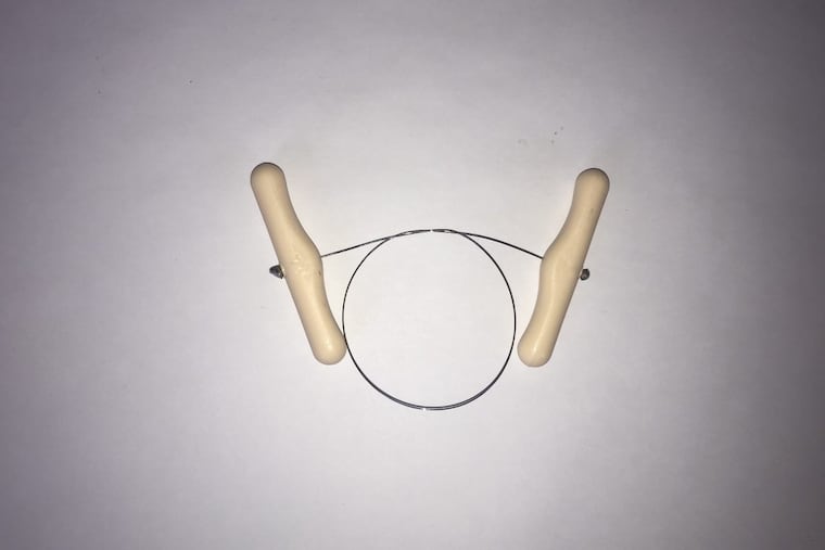 A cheese wire from Fante’s Kitchen Shop.