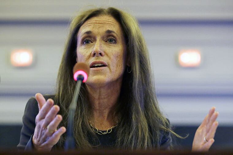 Regina Egea, left, answers a question as she appears before the legislative panel investigating politically motivated traffic jams, Thursday, July 17, 2014, in Trenton, N.J. Egea, Gov. Chris Christie's pick to be his next chief of staff, is set to be the fifth person from his administration to appear before a joint legislative committee investigating politically motivated traffic jams. (AP Photo/Mel Evans)