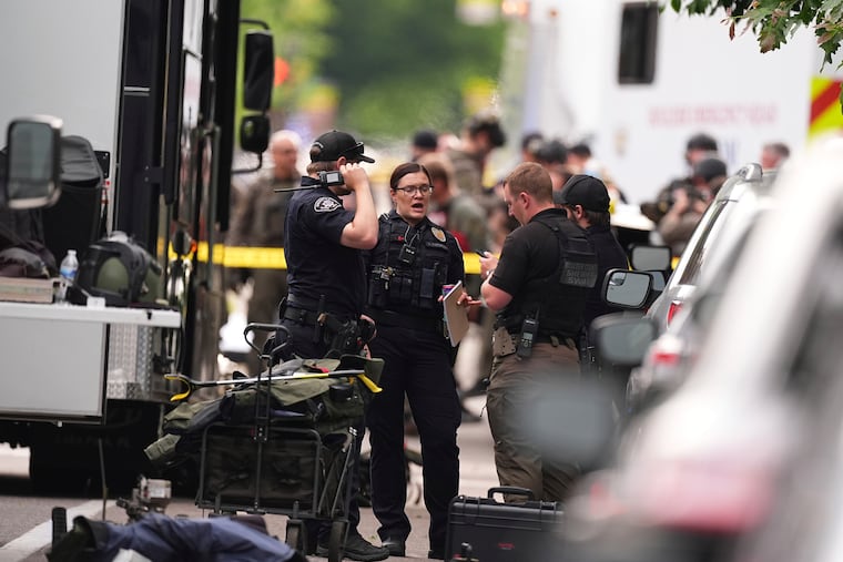 Law enforcement officials investigate after an attack in Boulder, Colo., on Sunday, June 1, 2025.