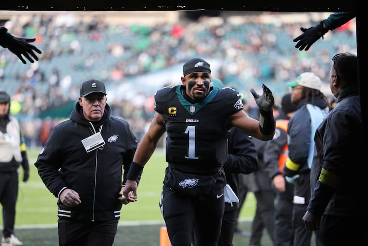 Eagles quarterback Jalen Hurts jogs off the field before their loss to the Chicago Bears on Black Friday.