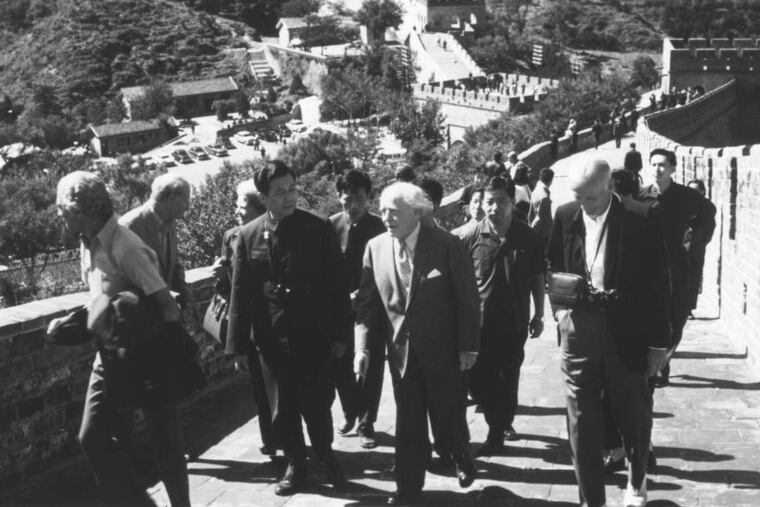 At the Great Wall in 1973, when Philadelphia's was the first U.S. orchestra to play for a Mao Tse-tung era Chinese audience, were music director Eugene Ormandy (center) and board chief C. Wanton Balis (right).