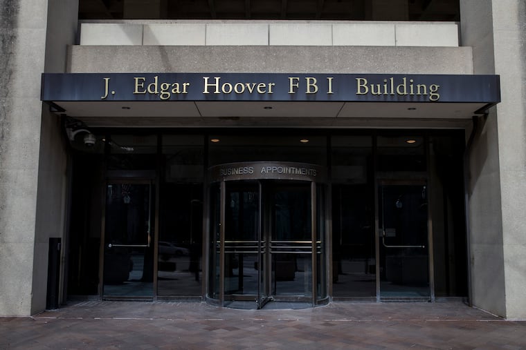 The J. Edgar Hoover FBI Building on Monday, March 4, 2019, in Washington. The FBI is stepping up its efforts to root out foreign corruption with a new squad of agents in Florida. The Miami-based squad begins later this month as part of the bureau’s international corruption unit. (AP Photo/Alex Brandon)