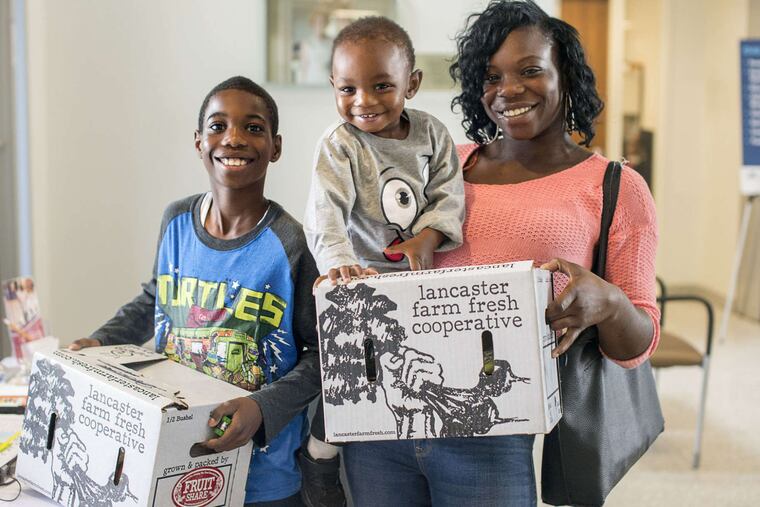 The Montgomery family - (from left) Jy-Shair, Ty'Heir, and Natasha - got fresh produce through FreshRx.