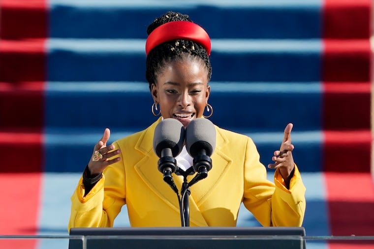 American poet Amanda Gorman reads a poem during Joe Biden's inauguration ceremony.